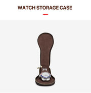 Travel watch case standing open with a watch