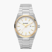 Two-tone watch with a gold-tone bezel, white dial and silver-tone integrated bracelet.