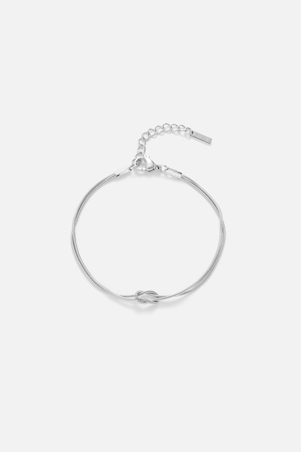 Silver-tone fine chain bracelet with a knot, front view on a light background