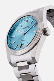 Angled view of the round case and turquoise dial