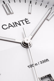 Close-up of the white sunburst dial, baton markers and hands