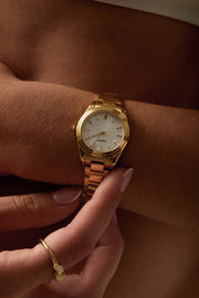 Woman adjusting the watch on her wrist