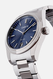 Angled view of the round case and blue dial