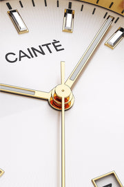 Close-up of the white sunburst dial, baton markers and hands