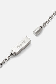 Magnetic bar clasp of the chain bracelet shown open
