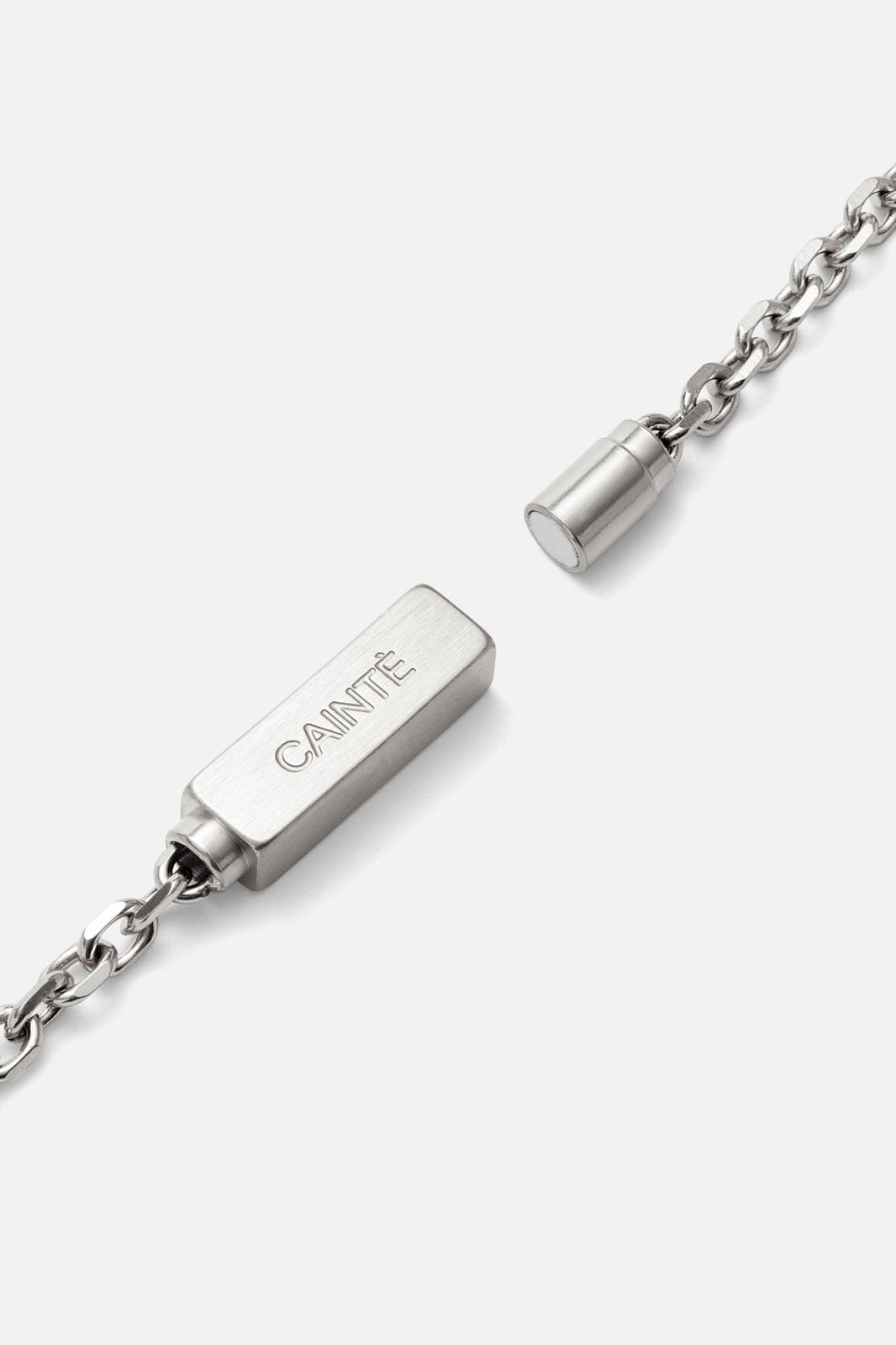 Magnetic bar clasp of the chain bracelet shown open