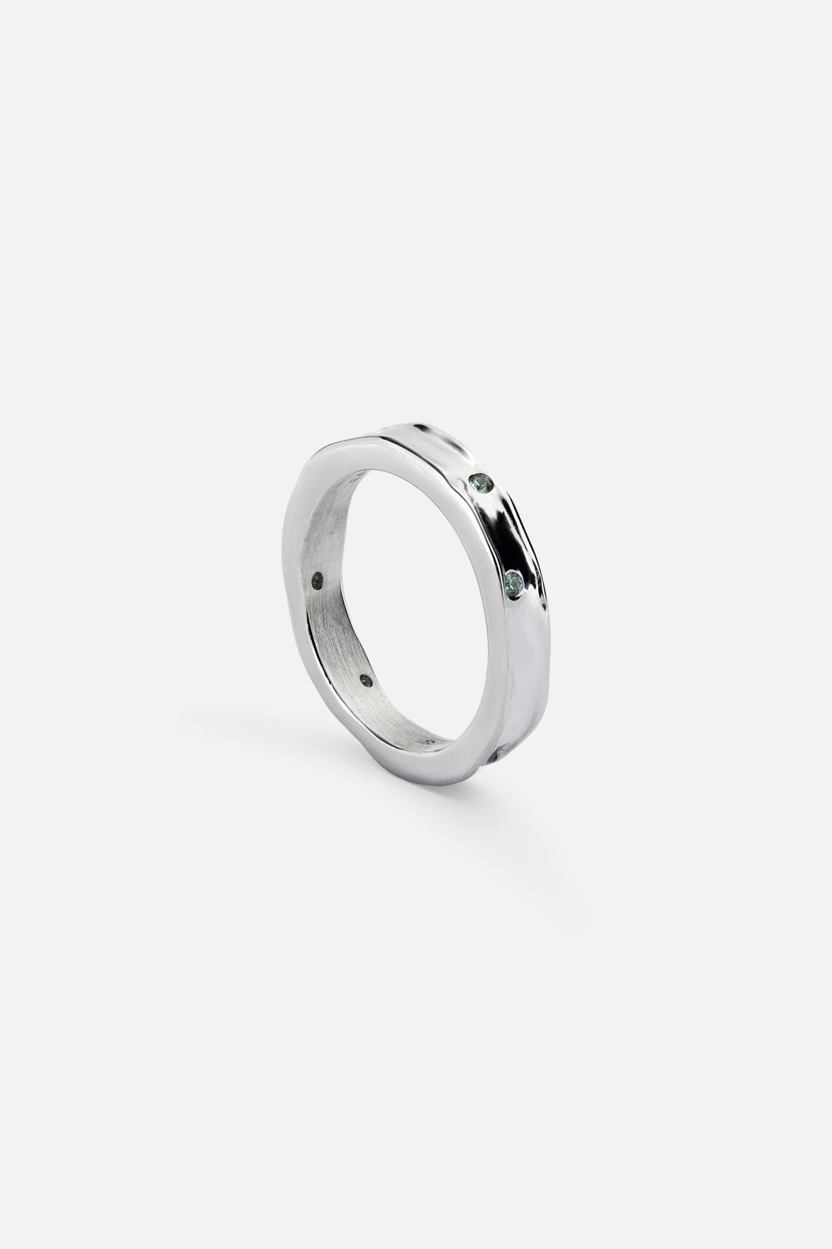 Textured band ring at an angle