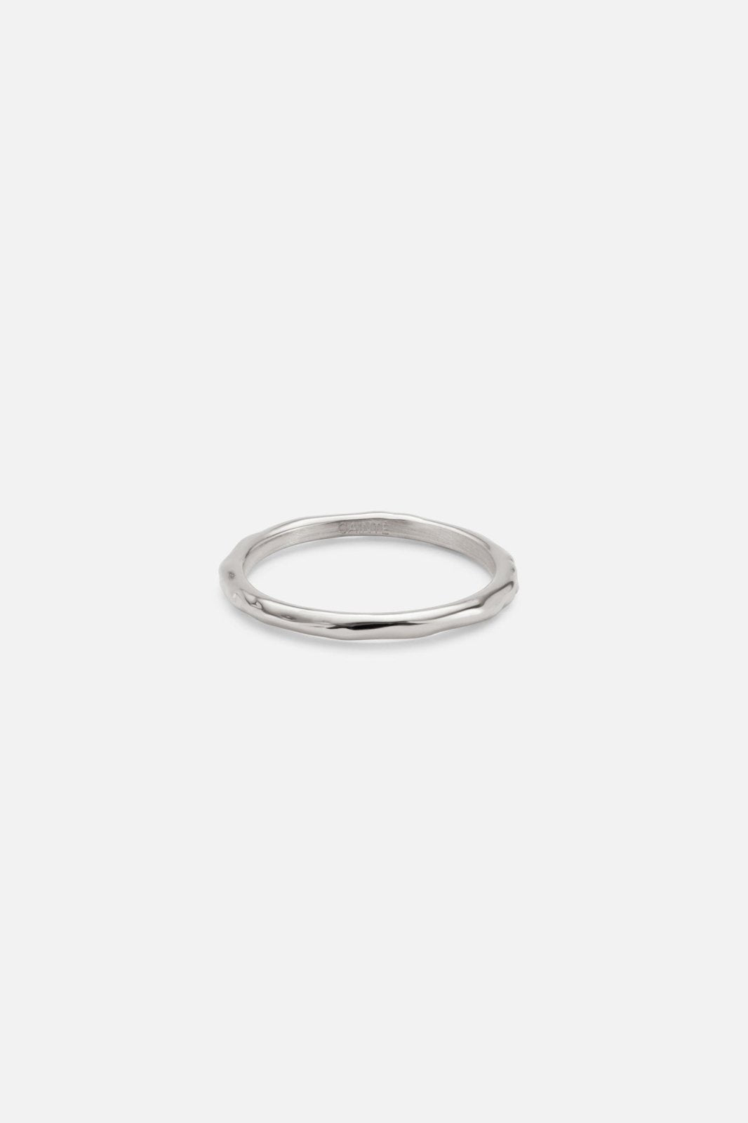 Silver-tone thin band ring, front view on a light background