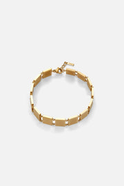 Gold-tone square plate link bracelet, front view on a light background