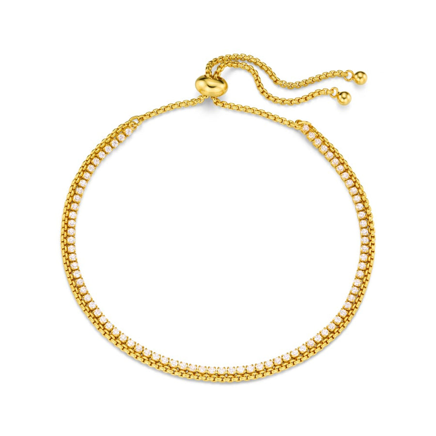 Gold-tone slider bracelet with a row of clear stones and fine chain