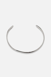 Silver-tone slim open bangle, front view on a light background