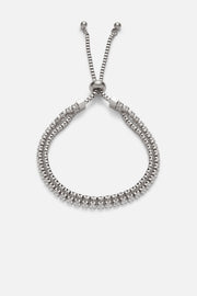 Silver-tone sparkling mesh slider bracelet, front view on a light background