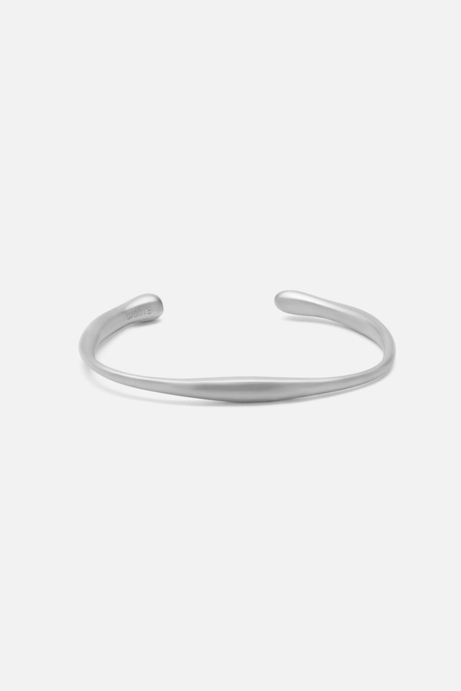 Silver-tone narrow matte cuff, front view on a light background