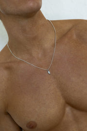 Silver-tone necklace with a small white inlay tag, view 6 of 7