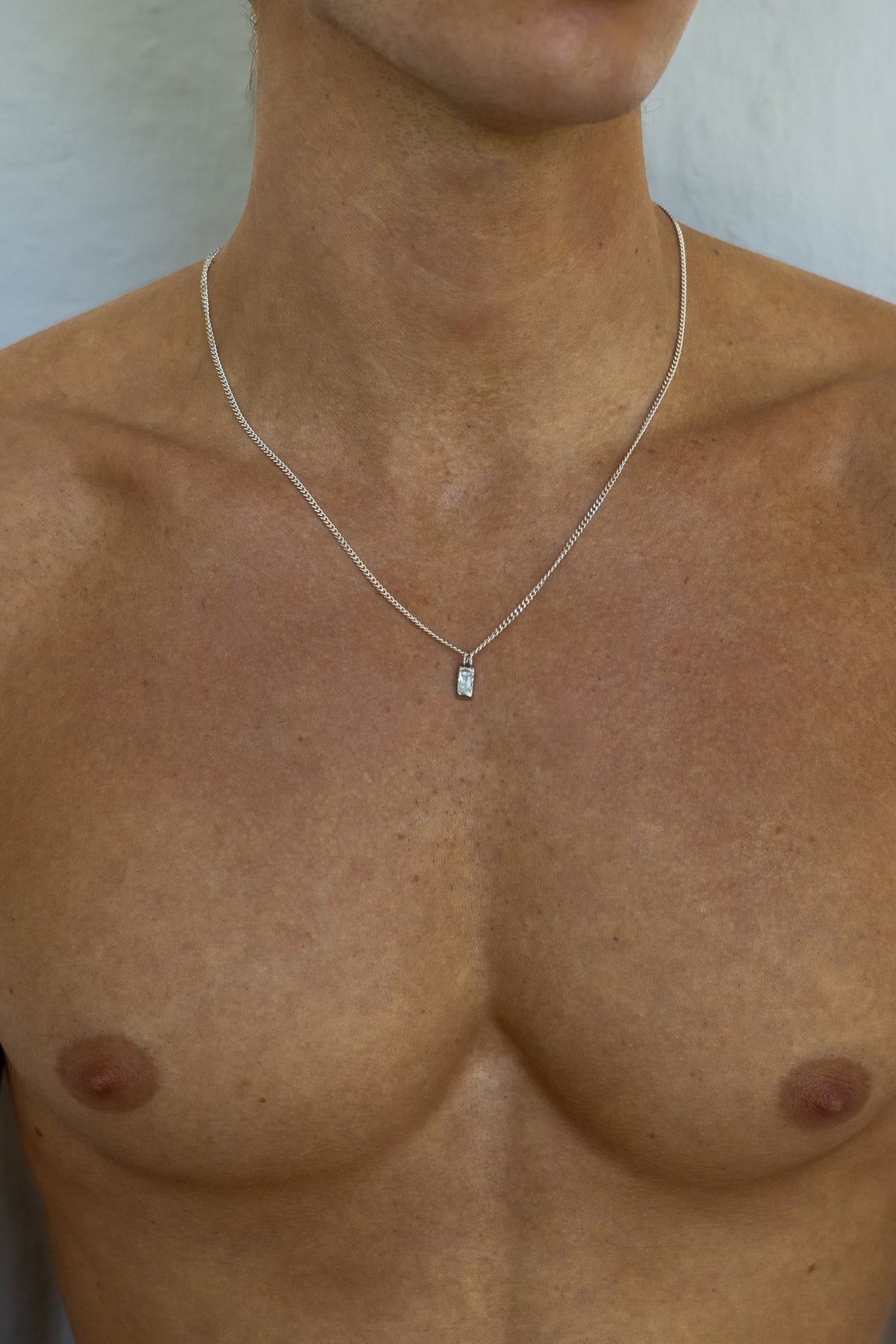 Silver-tone necklace with a small white inlay tag, view 2 of 7