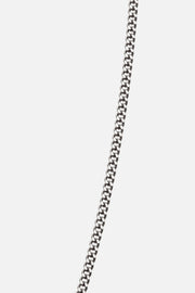 Silver-tone necklace with a small white inlay tag, view 3 of 7