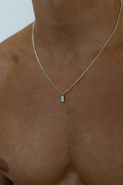 Silver-tone necklace with a small white inlay tag, view 4 of 7