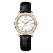 Rose gold-tone watch on black strap