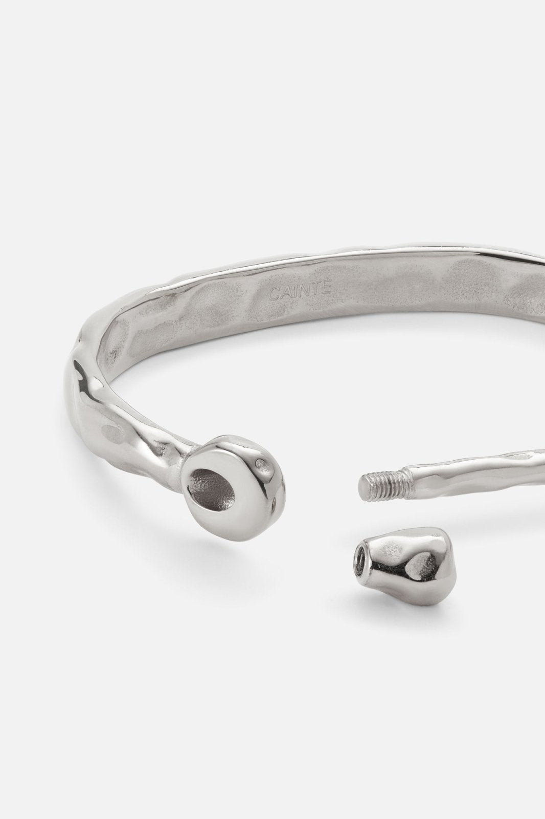 Silver-tone rigid bangle with screw-head ends, view 5 of 7