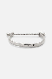 Silver-tone rigid bangle with screw-head ends, view 3 of 7