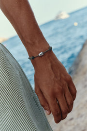 Brown cord bracelet with a white bead, view 6 of 6