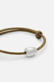Brown cord bracelet with a white bead, view 5 of 6