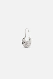 Hammered disc earring at an angle