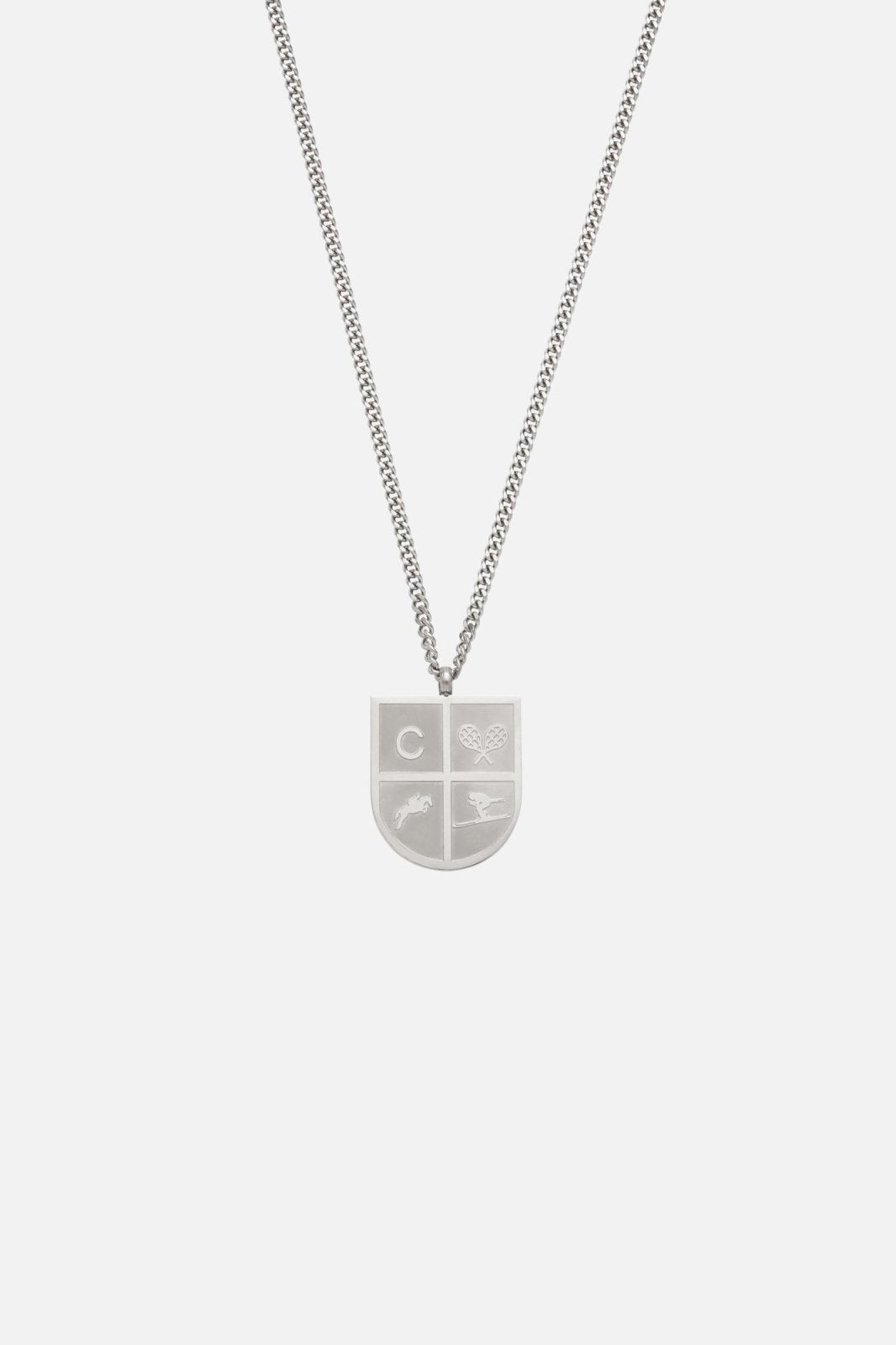 Silver-tone shield pendant necklace, front view on a light background