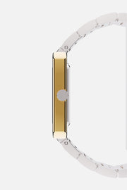 Side profile showing the slim case and fluted crown