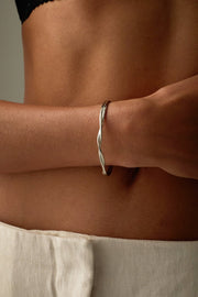 Silver-tone wavy crossover cuff, view 2 of 6