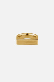Gold-tone wide flat-top signet ring, front view on a light background