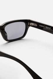 Close-up of the hinge and gray lens