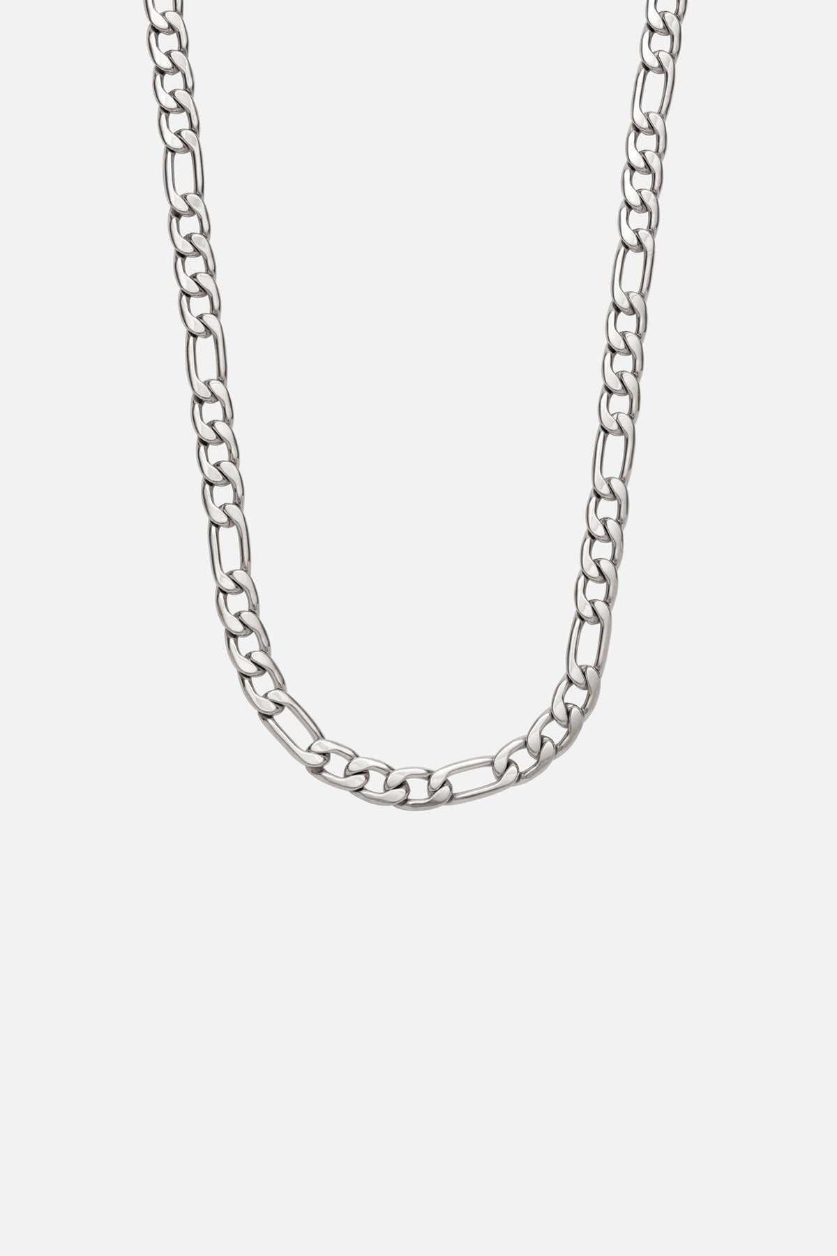 Silver-tone figaro chain necklace, relaxed style, front view on a light background