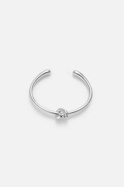 Silver-tone slim tied knot cuff bracelet, front view on a light background