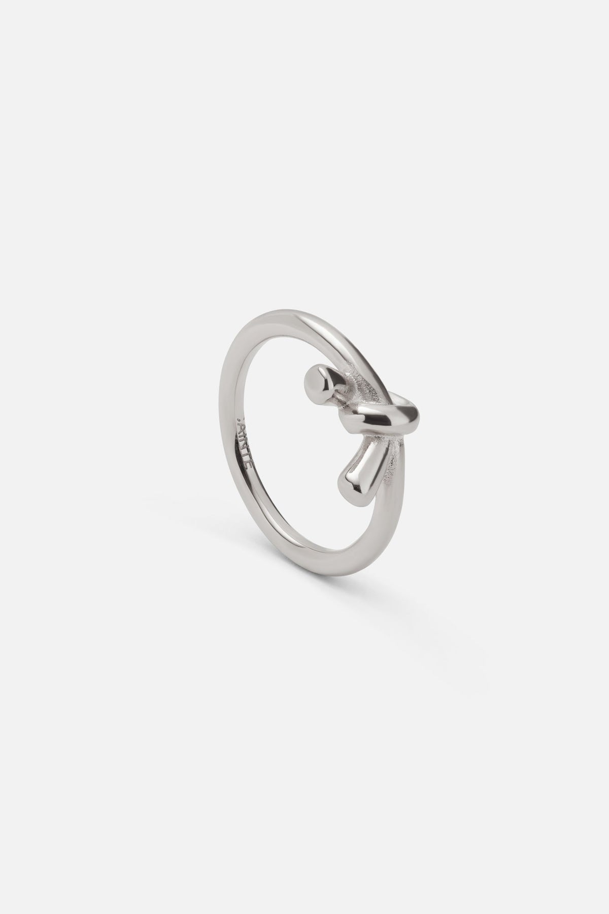 Silver-tone knot ring, side view