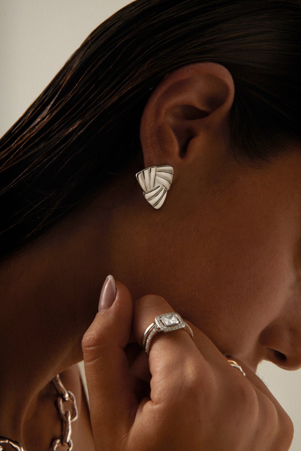 Close-up of the triangle stud on the ear