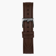 Dark brown strap with tonal stitching and a gunmetal pin buckle.