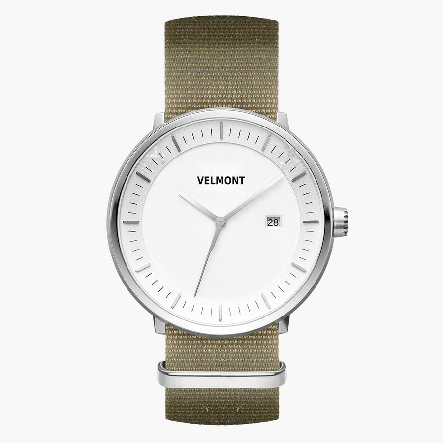 Watch with a white dial and silver-tone case on an olive green woven strap.