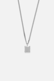 Silver-tone ridged tag pendant necklace, front view on a light background