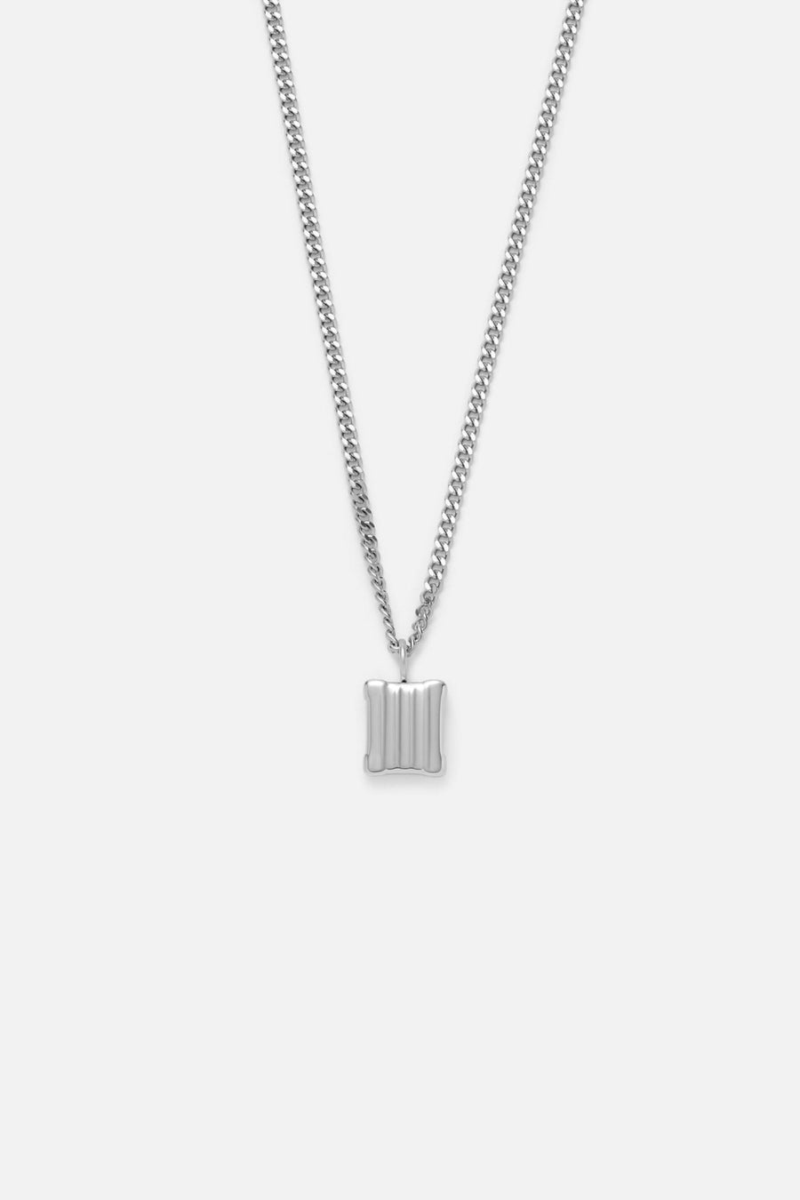 Silver-tone ridged tag pendant necklace, front view on a light background