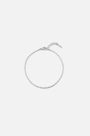 Silver-tone fine textured chain bracelet, front view on a light background