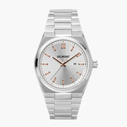 Watch with a silver sunburst dial, rose gold-tone indices and an integrated silver-tone bracelet.